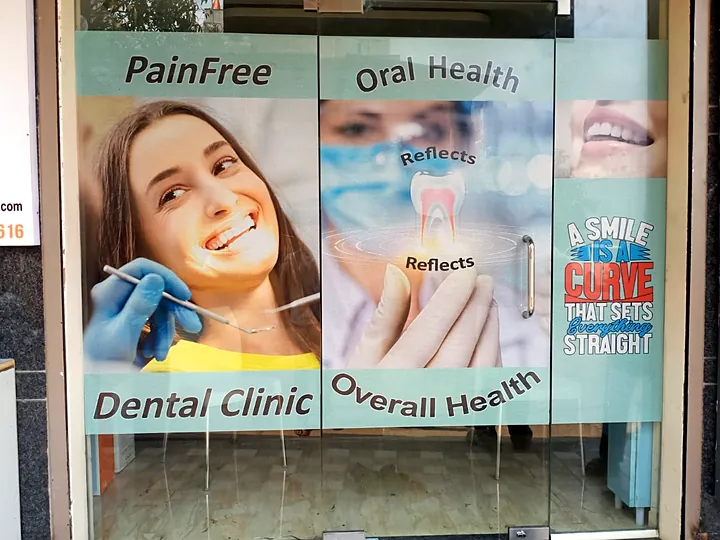 Printed vinyl graphics on a dental clinic's glass door and windows